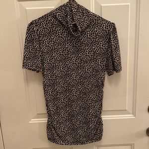 Micheal Kora turtleneck blouse. Size small. Cute for the summer.